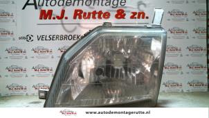 O73032 Gebruikte koplamp links Daihatsu Gran Move