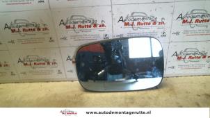 Gebruikte Spiegelglas links Renault Laguna II Grandtour (KG) 1.8 16V Prijs op aanvraag aangeboden door Autodemontage M.J. Rutte B.V.