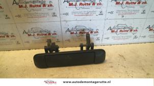 O80166 Gebruikte portiergreep 4deurs links-voor Mazda Demio