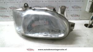 O73246 Gebruikte koplamp rechts Ford Courier
