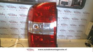 O93454 Gebruikte achterlicht links Kia Carnival