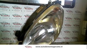 O72613 Gebruikte linker koplamp Citroen Picasso
