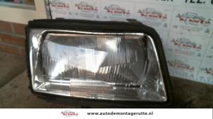 O73182 Gebruikte rechter koplamp Audi 100