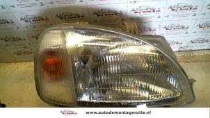 O74459 Gebruikte rechter koplamp Daihatsu Charade