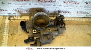 O122995 Gebruikte gasklephuis Subaru Legacy