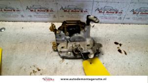 O82448 Gebruikte slotmechaniek portier 2deurs links Nissan Micra