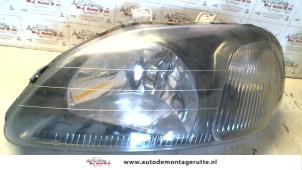 O72912 Gebruikte koplamp links Honda Civic