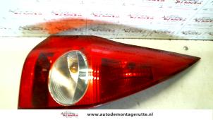 O93749 Gebruikte achterlicht links Renault Megane