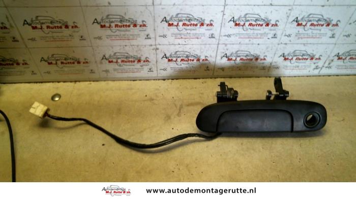 Gebruikte Deurgreep 4Deurs links-voor Mazda 323F O80163