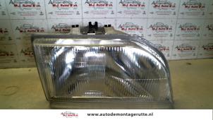 O73245 Gebruikte koplamp rechts Ford Courier