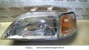 O72913 Gebruikte koplamp links Honda Civic
