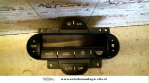 O100436 Gebruikte chaufage bedieningspaneel Kia Carens