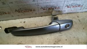 O80173 Gebruikte deurgreep 4deurs links-voor Mazda 6.