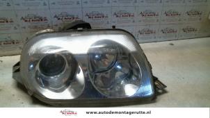 O73620 Gebruikte rechter koplamp Alfa Romeo GTV