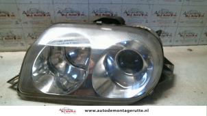 O72160 Gebruikte koplamp links Alfa Romeo GTV