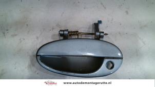 O80155 Gebruikte portiergreep 4deurs links-voor Chevrolet Tacuma