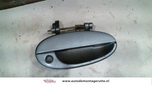 O81008 Gebruikte portiergreep 4deurs rechts-voor Chevrolet Tacuma