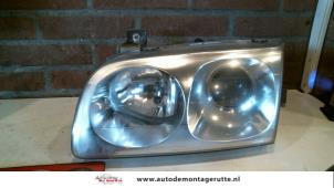 O72392 Gebruikte linker koplamp Hyundai Trajet