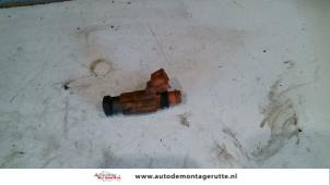 O121696 Gebruikte injector (benzine injectie) Mitsubishi Carisma