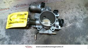 O122996 Gebruikte gasklephuis Subaru Impreza