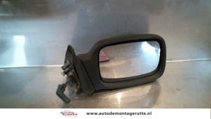 O86509 Gebruikte buitenspiegel rechts Ford Escort