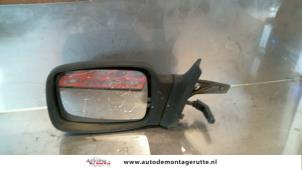 O84228 Gebruikte buitenspiegel links Ford Escort