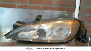 O72406 Gebruikte linker koplamp Nissan Primera