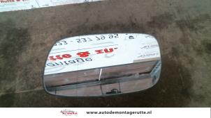 O85886 Gebruikte spiegelglas links Opel Astra
