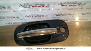 O80206 Gebruikte deurgreep 4deurs links-voor Hyundai Trajet