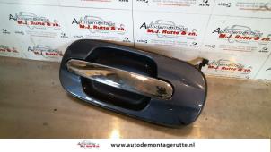 O89395 Gebruikte portiergreep 4deurs links-achter Hyundai Trajet