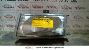 O72154 Gebruikte koplamp links Volkswagen Caddy