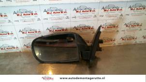 O85578 Gebruikte spiegel buiten links Daihatsu Charade