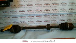 O111664 Gebruikte aandrijfas rechts-voor Nissan Almera