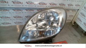 O72444 Gebruikte koplamp links Nissan Kubistar
