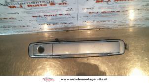 O81119 Gebruikte portiergreep 4deurs rechts-voor Ssang Yong Rexton