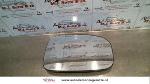 O86167 Gebruikte spiegelglas links Peugeot 306
