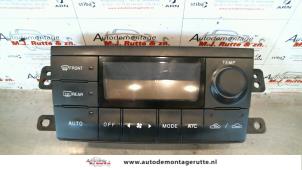 O100320 Gebruikte chaufage bedieningspaneel Mazda Premacy