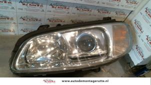 O71989 Gebruikte koplamp links Opel Omega