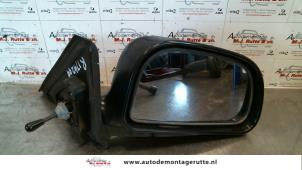 O87750 Gebruikte spiegel buiten rechts Mitsubishi Colt