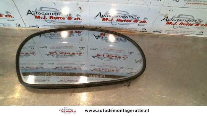 Spiegelglas rechts van een Kia Rio (DC22/24) 1.5 RS,LS 16V 2001