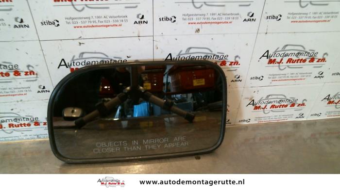 Gebruikte Spiegelglas links Kia Joice O86118