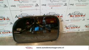 Gebruikte Spiegelglas links Kia Joice 2.0 16V Prijs op aanvraag aangeboden door Autodemontage M.J. Rutte B.V.
