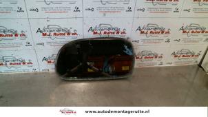 O86324 Gebruikte spiegelglas links Toyota Corolla