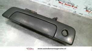 O79953 Gebruikte portiergreep 2deurs links Mitsubishi Colt