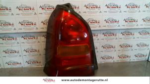 O94163 Gebruikte achterlicht links Suzuki Alto