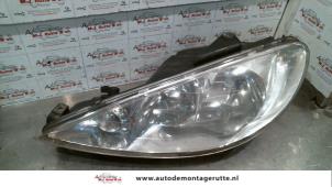 O72664 Gebruikte koplamp links Peugeot 206