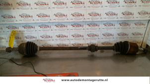 O111658 Gebruikte cardanas rechts-voor (vwa) Nissan Micra