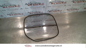 O86192 Gebruikte spiegelglas links Peugeot Partner