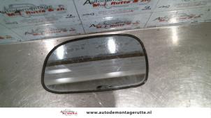 O86325 Gebruikte spiegelglas links Toyota Corolla