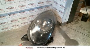 O72428 Gebruikte linker koplamp Nissan Micra
